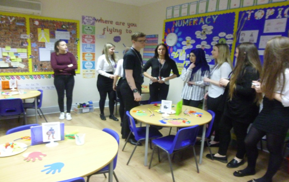 Wirral Met Level 3 Travel and Tourism students in a classroom at Auckland College in Liverpool, there to gain experience as a child representative