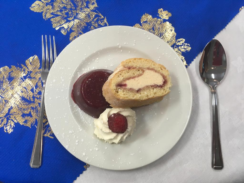 Wirral Met Student Celebratory Lunch 2017 desert plate with Arctic Roll, Raspberry and Whipped Cream
