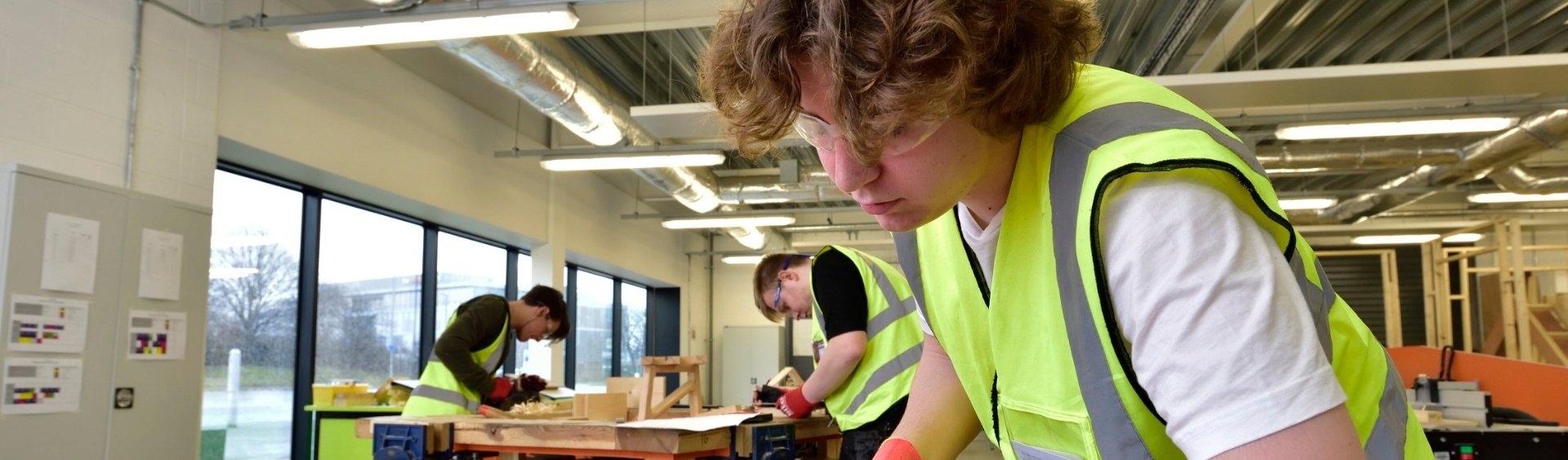 WMC Construction Crafts student working inside classroom