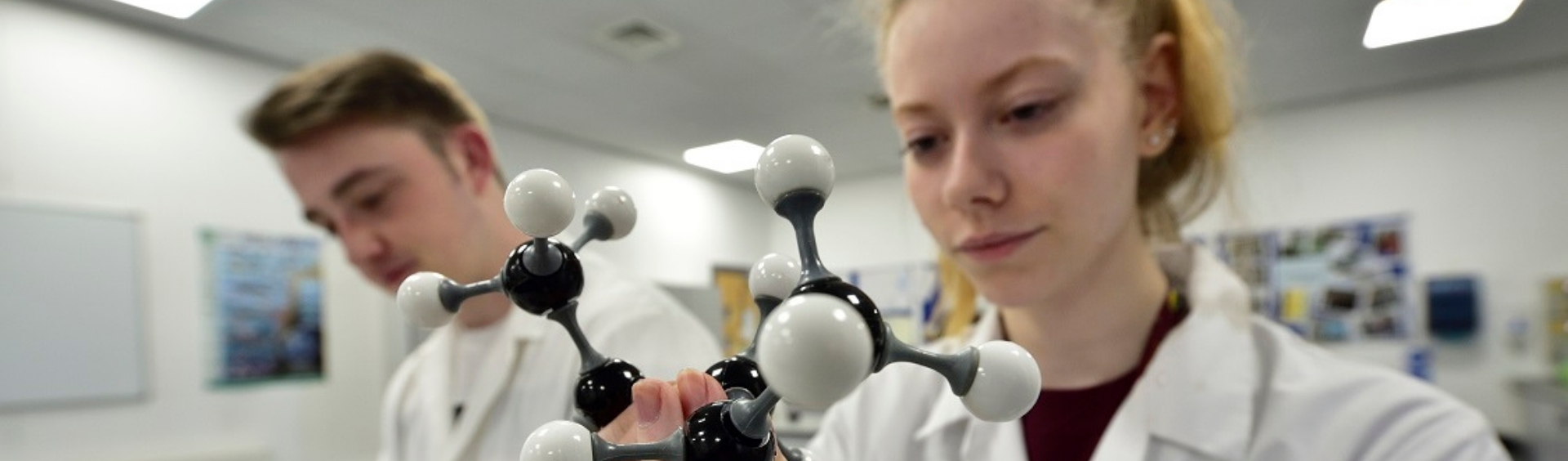 Two WMC Introduction to Psychology students working inside Science classroom