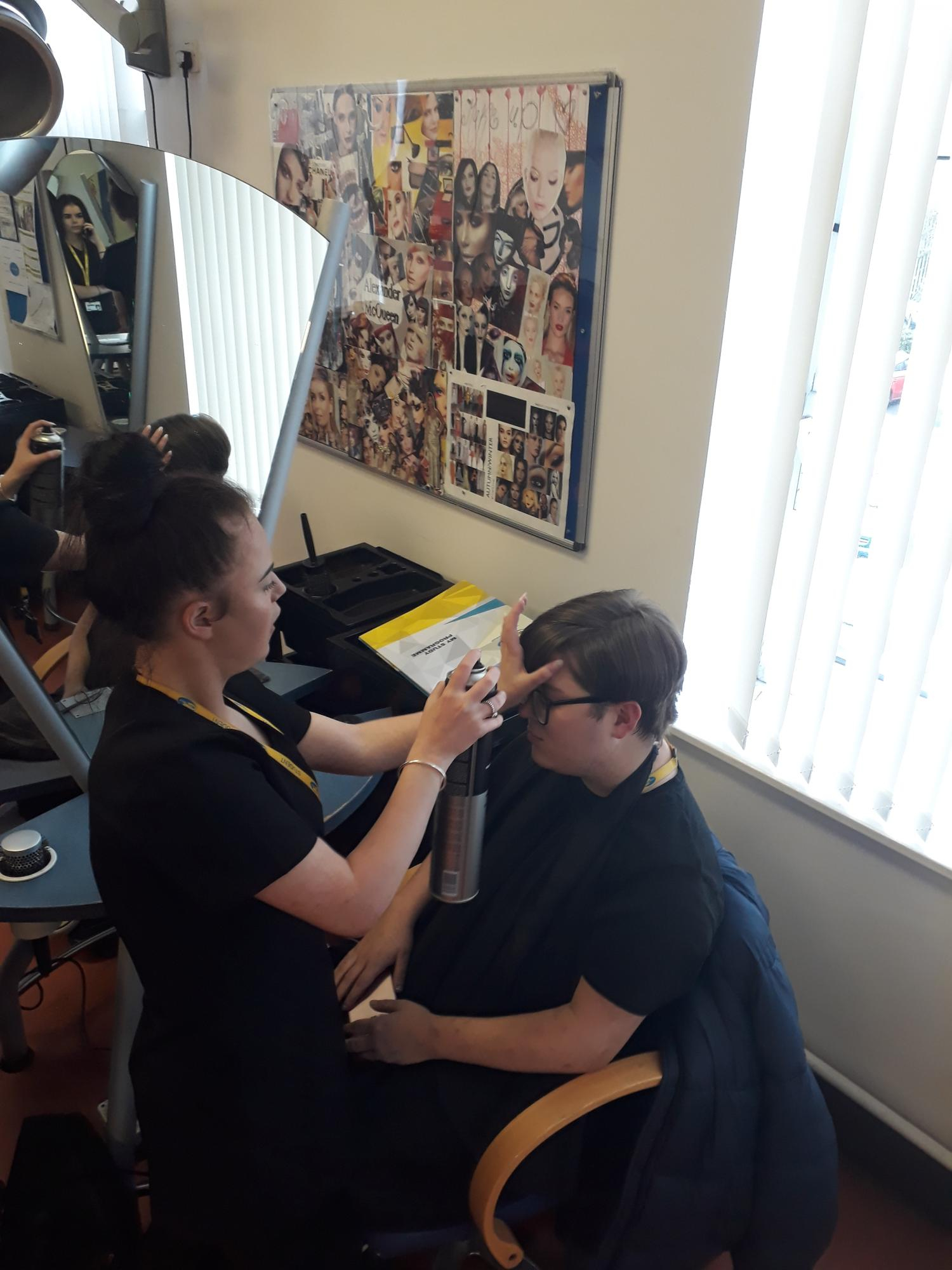 Wirral Met Hair and Beauty student working on Male student