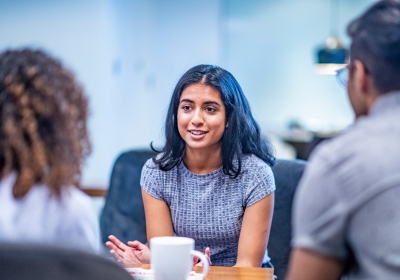 Wirral Met Counselling students working with each other in a classroom