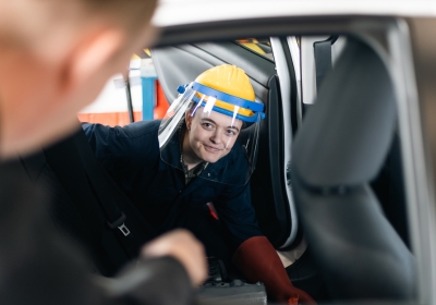 Male Part Time Engineering Student Working In Workshop