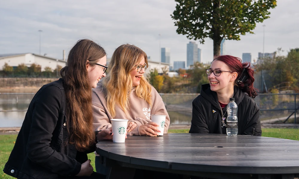 Female Wirral Met student speaking to member of staff regarding mental health