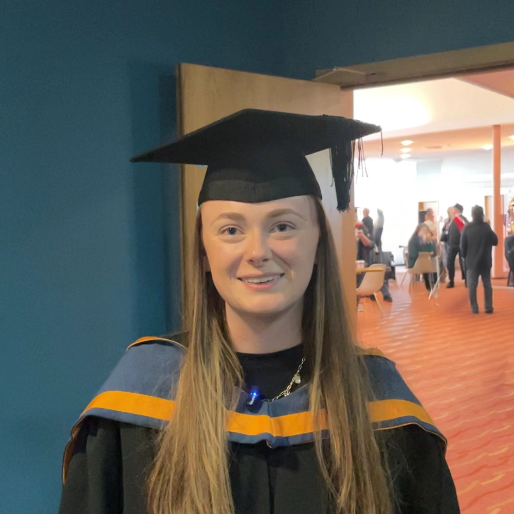 CIPD graduate Abbey Schofield receiving award at Higher Education Awards ceremony at the Floral Pavilion