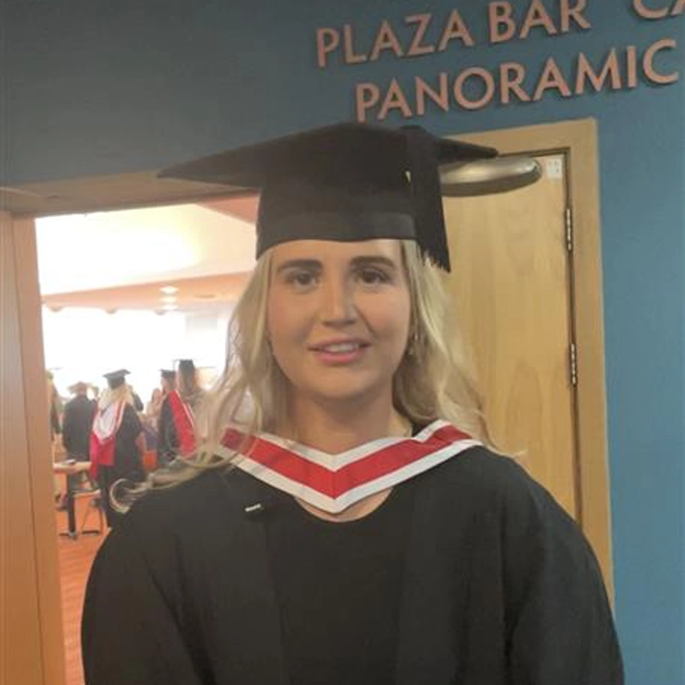 Sociology with Criminology graduate Olivia Sherlock celebrating during the Higher Education awards ceremony at the Floral Pavilion