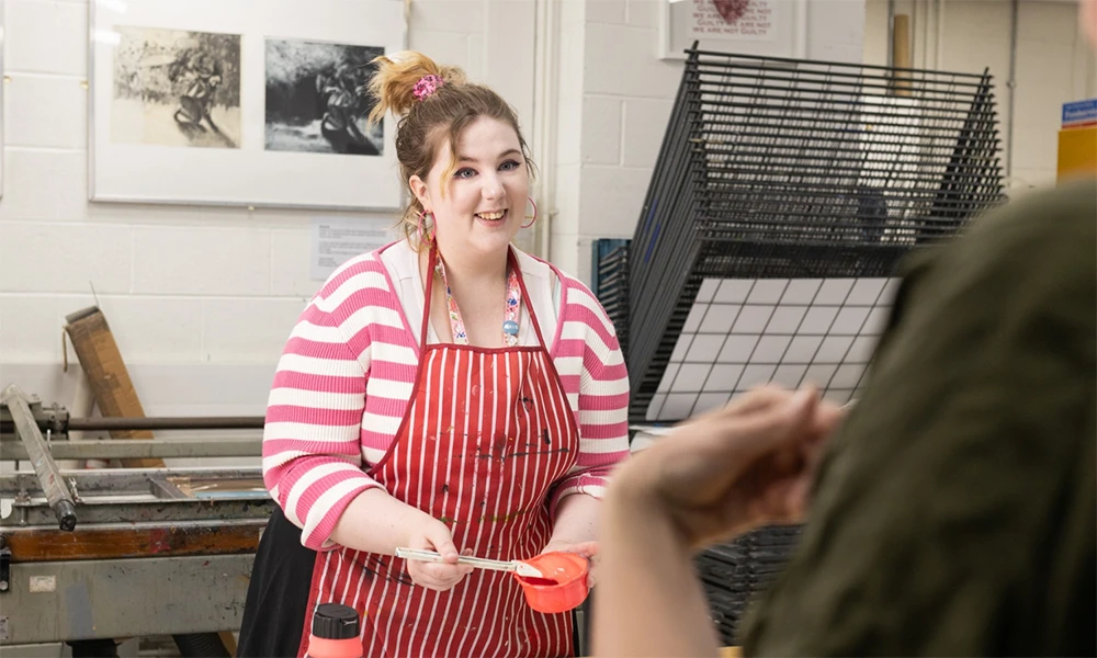Art and Design student working inside art classroom at Twelve Quays