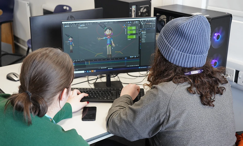 Creative Media students working with industry equipment and green screens