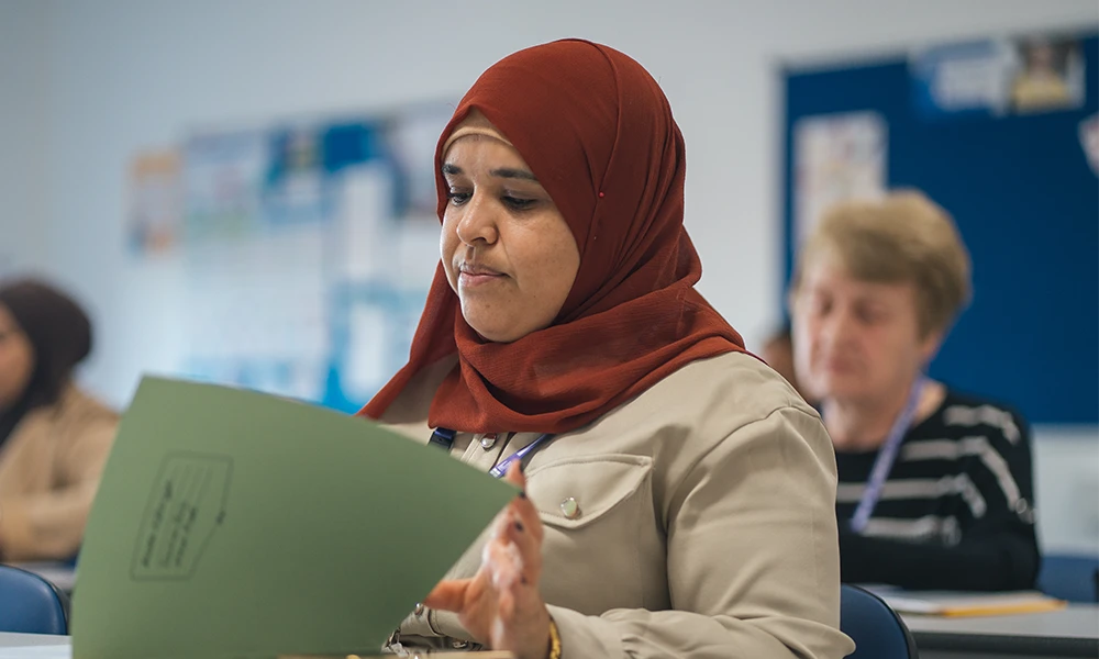 ESOL student standing inside Conway Park campus