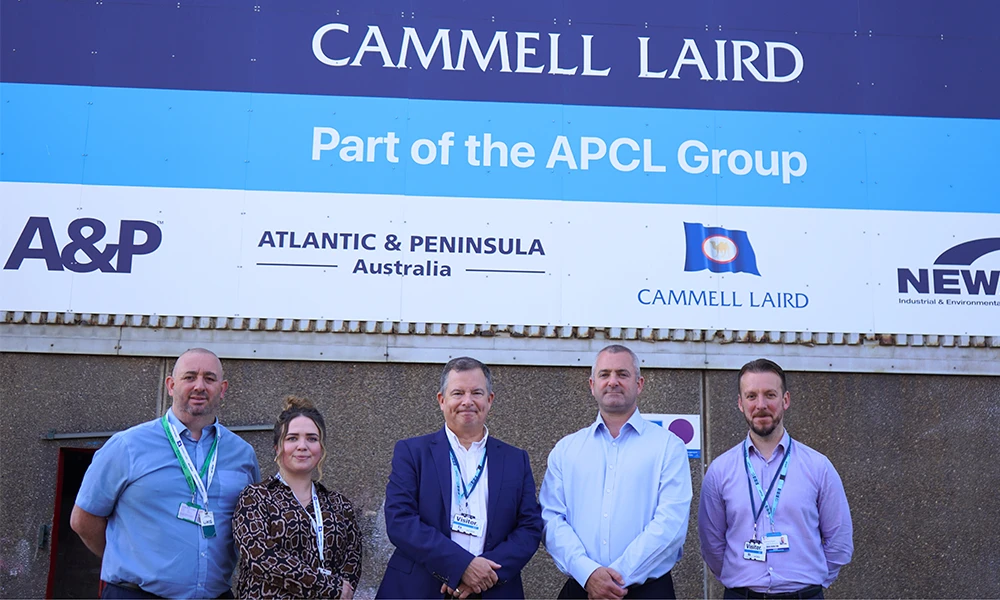 Members of Wirral Met and Cammell Laird standing together on site