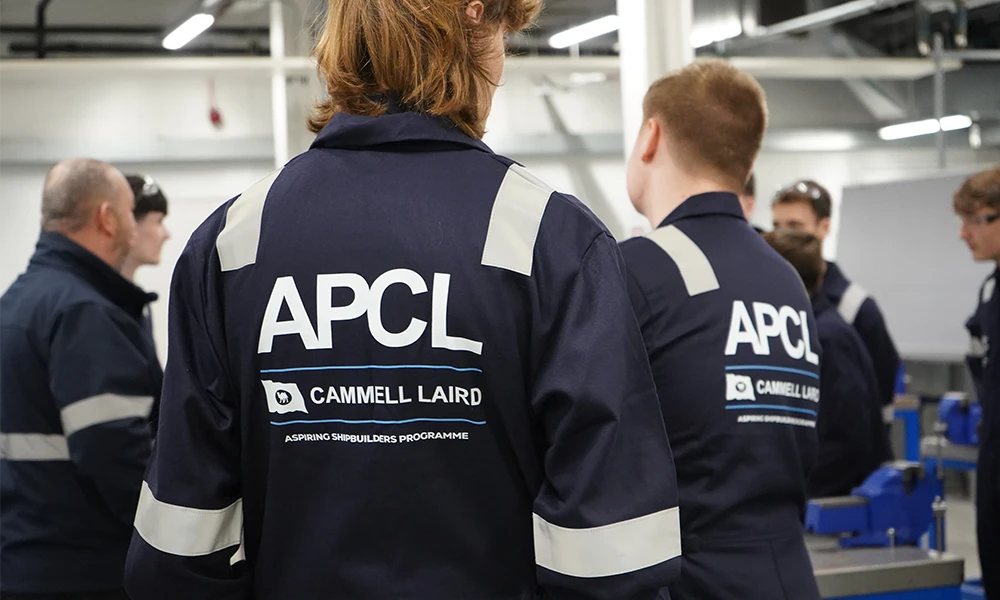Engineering students working inside workshop at Twelve Quays