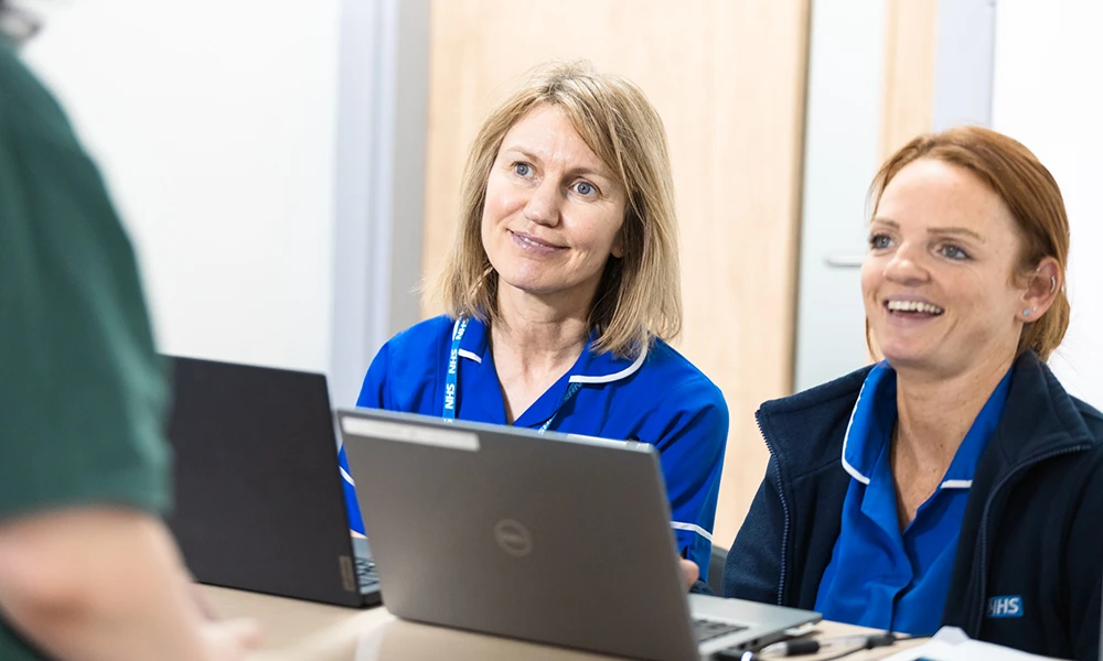 Health & Social Care students practicing techniques inside classroom
