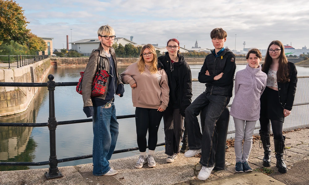 Two Wirral Met 16-18 year old students standing outside Twelve Quays classrooms