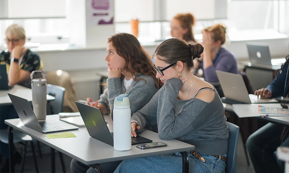 Psychology student working inside classroom