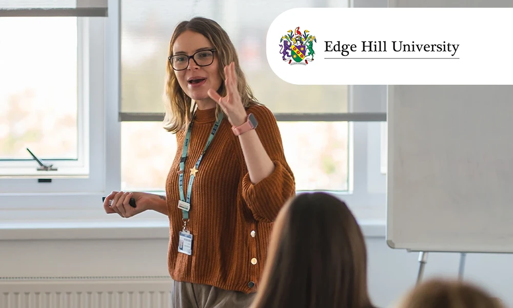 Teaching student standing at the front of class