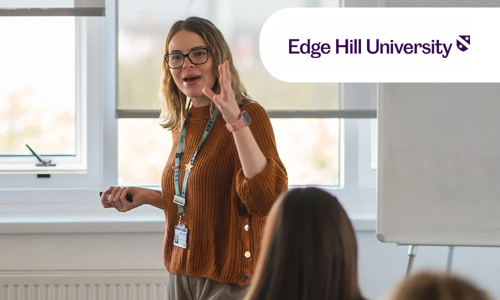 Teaching student standing at the front of class