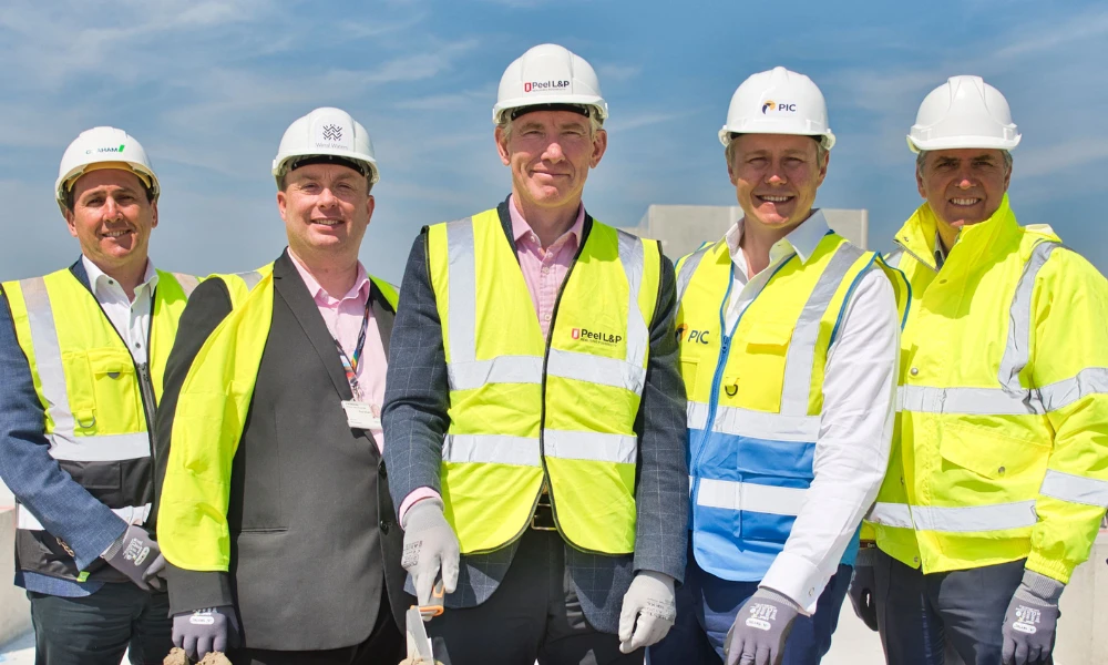 Wirral Met and Peel L&P staff members attending 'topping out' ceremony