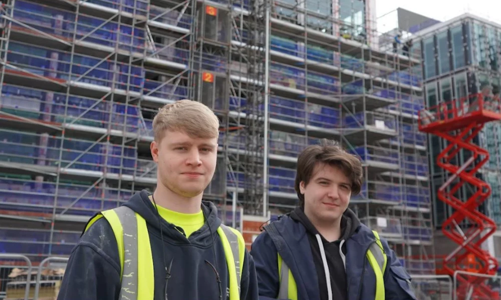 Two Wirral Met apprentices standing on construction site