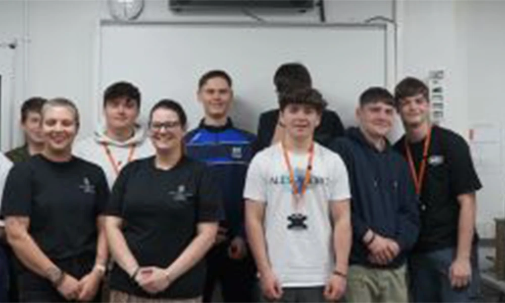 Hospitality students standing inside classroom