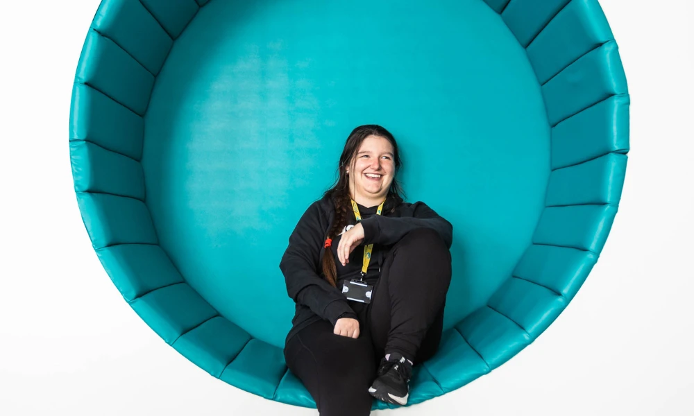 Wirral Met Prep For Life student sitting inside Independent Living Suite