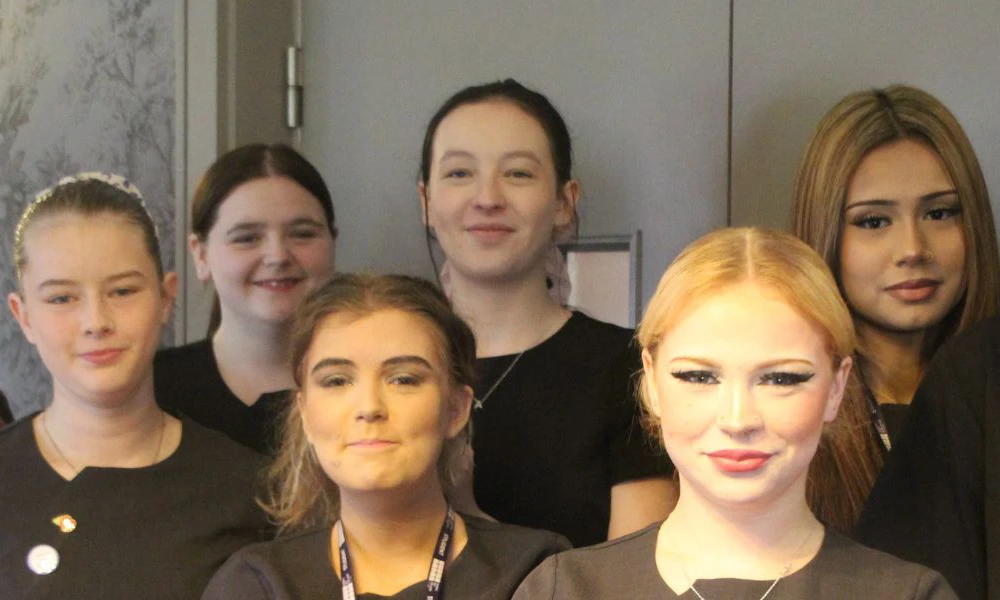 Wirral Met Hair and Makeup students posing for Strictly charity dance show