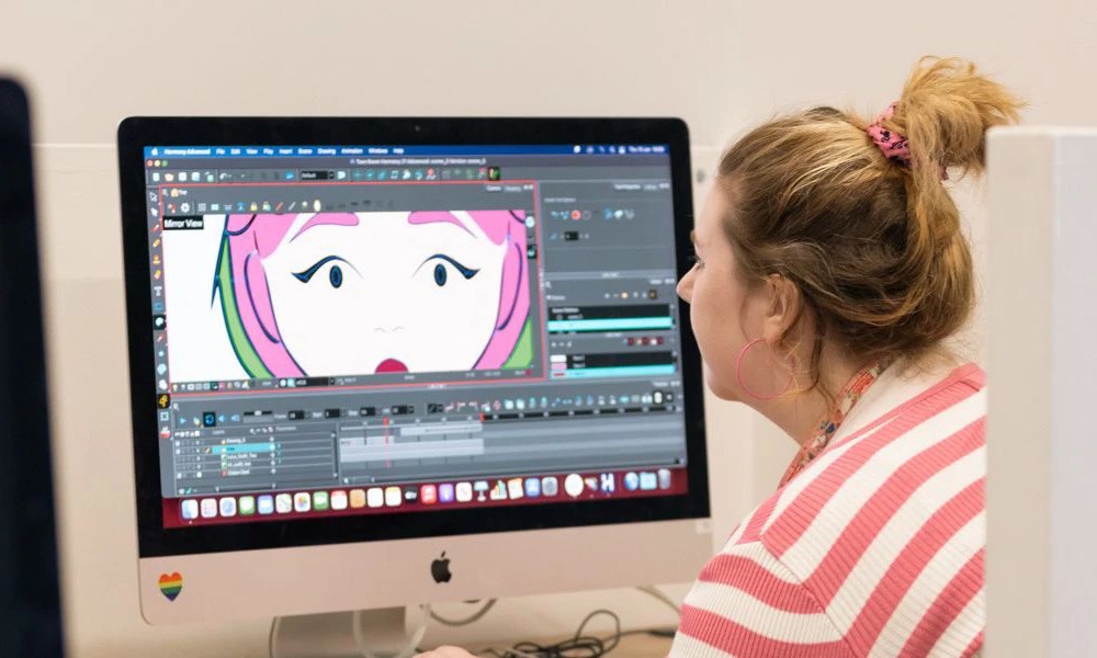 Illustration with Animation student creating an animation on a mac computer