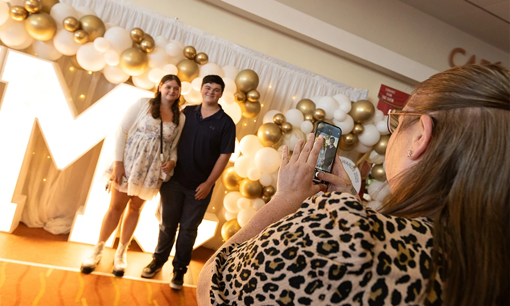 Attendees at the Wirral Met Further Education Awards ceremony having their picture taken at the Floral Pavilion