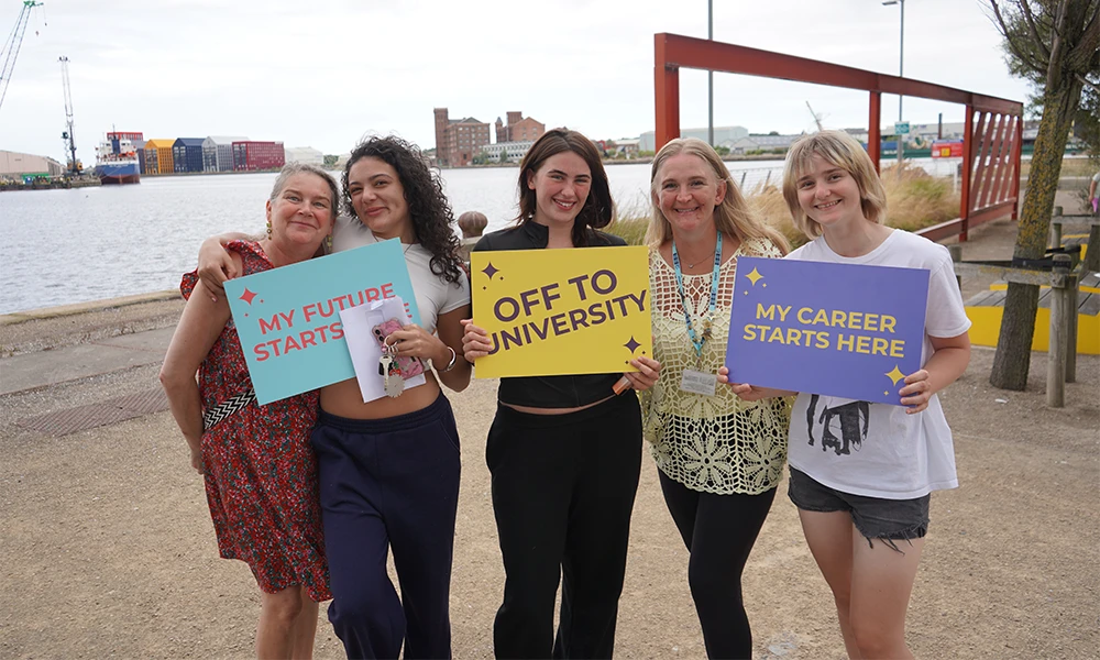 Five women celebrating BTEC Results day outside Wirral Waters campus