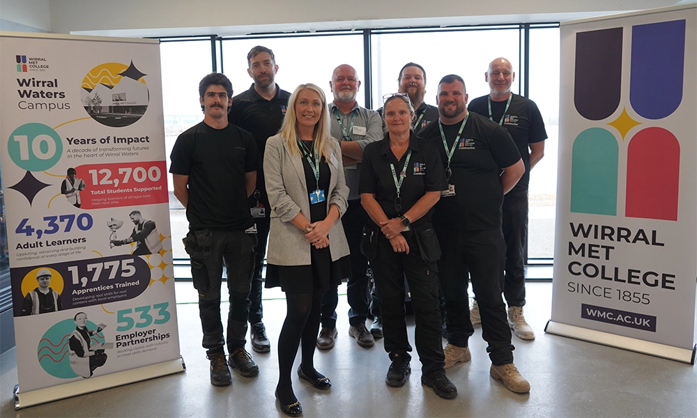Construction tutors celebrating during the Wirral Waters ten year anniversary