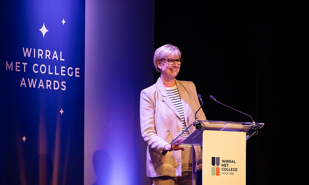 Five members of SLT Stood Together in front of balloon arch